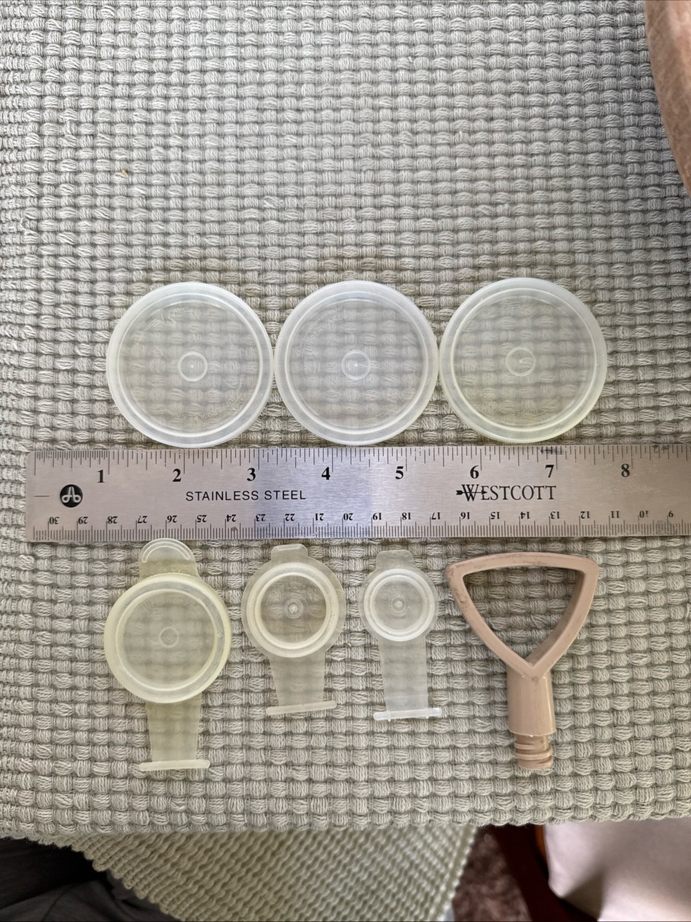 Tupperware various lids and Suzette Condiment handle. Used. Vintage.